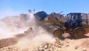 إزالة 15 حالة تعد بمساحة 13 ألف م2 بأسوان.. صور